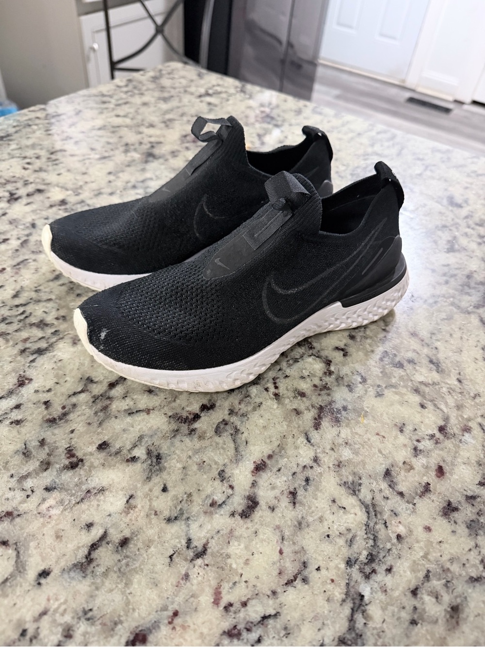 Nike Black Slip-On Knit Sneakers with White Sole